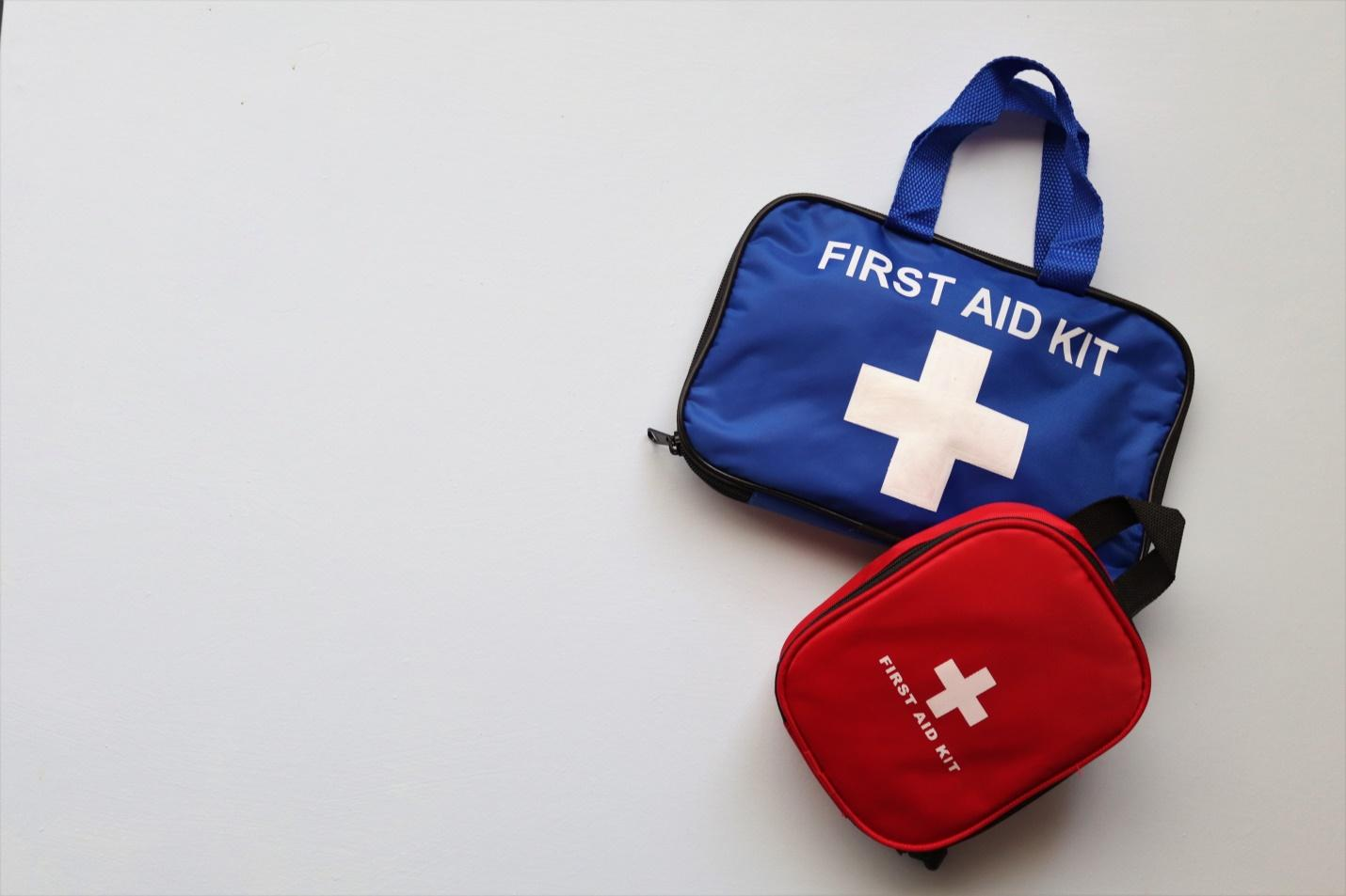 Occupational First Aid Courses: BC Businesses and First Aid Provisions Image description: two first aid kits on white background