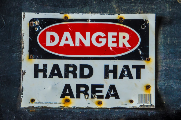 A hard hat area danger sign