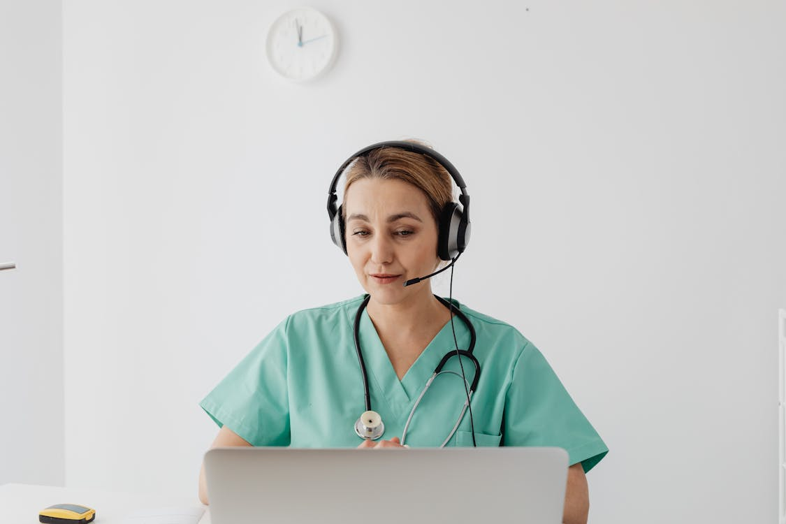 A doctor conducting an online consultation