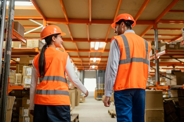 Professionals in a factory wearing safety gear