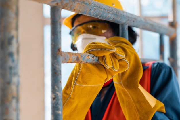 A person wearing PPE due to asbestos exposure