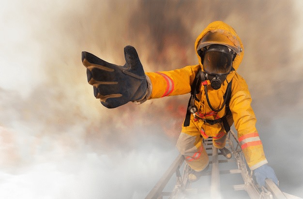 A firefighter rescuing residents